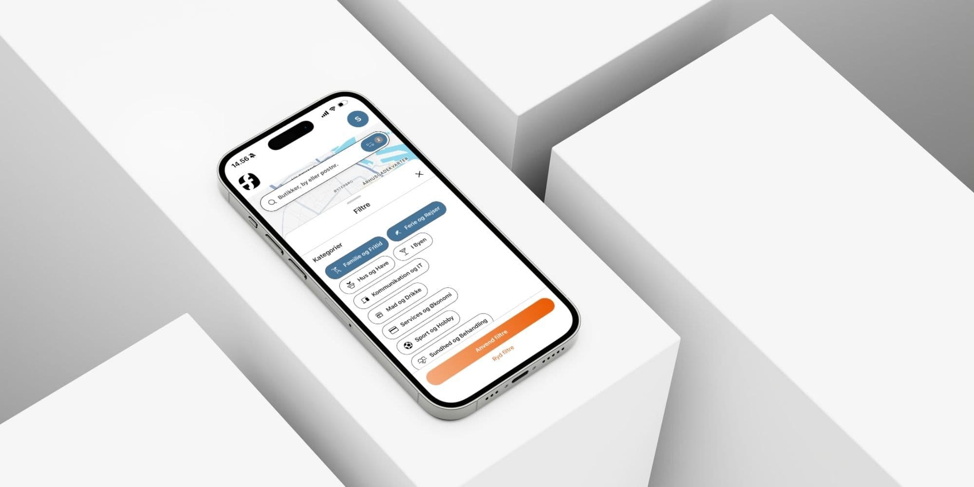 Billede af en smartphone med en Forbrugsforeningen app åben