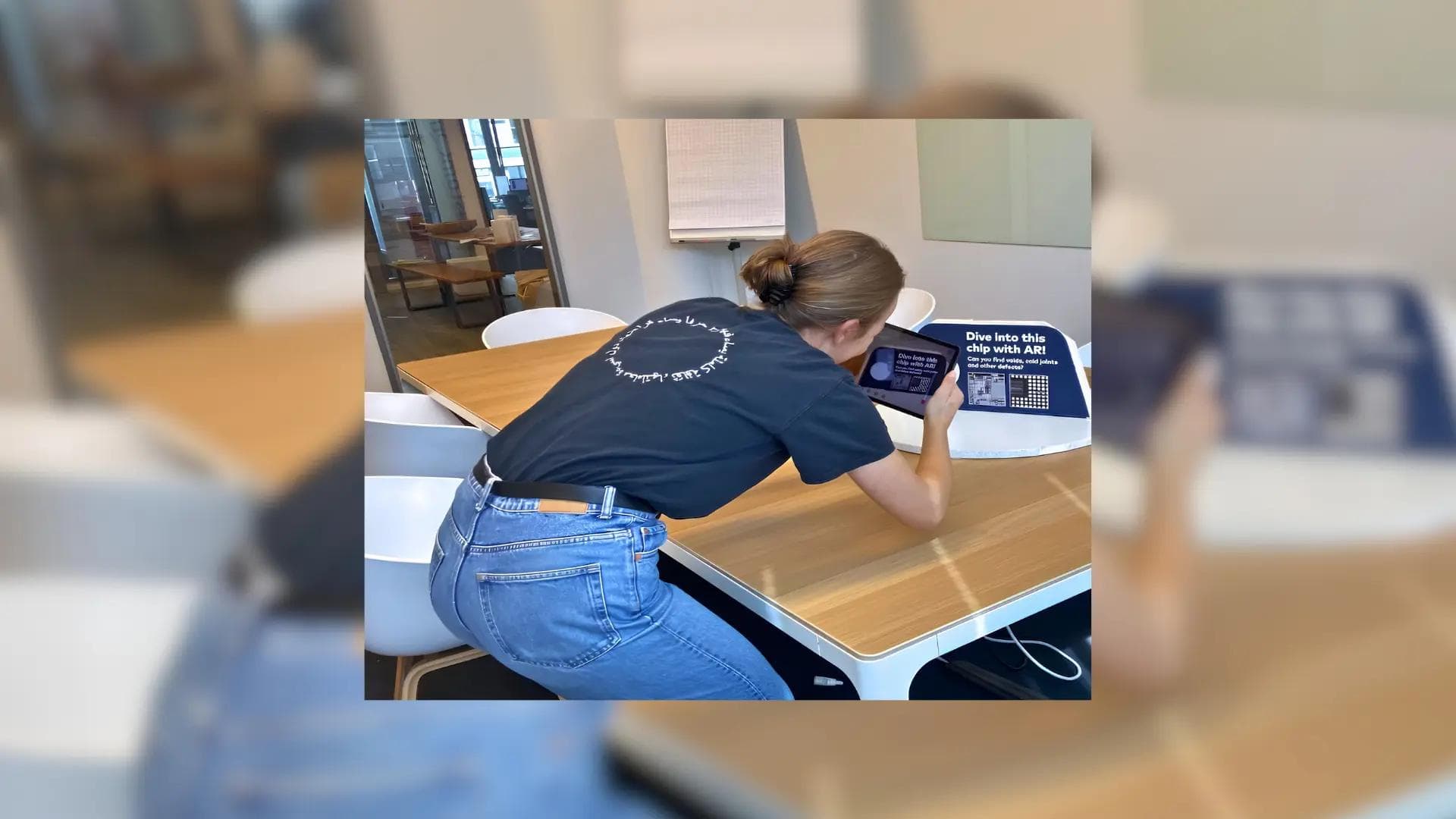 Person scanning a chip with AR